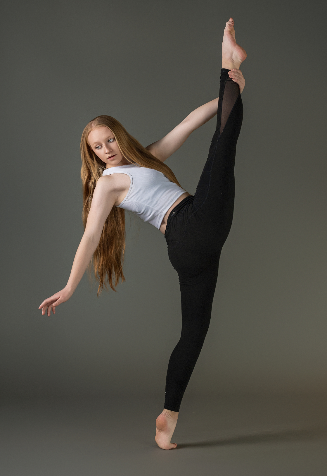 One woman in a dance pose