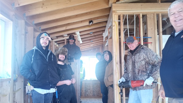 Construction Management crew building a tiny home