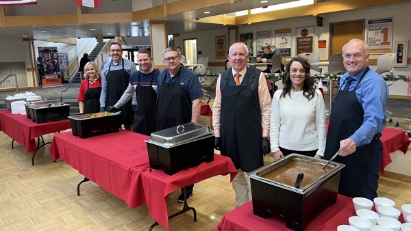 President's Cabinet members serve students and employees a holiday meal